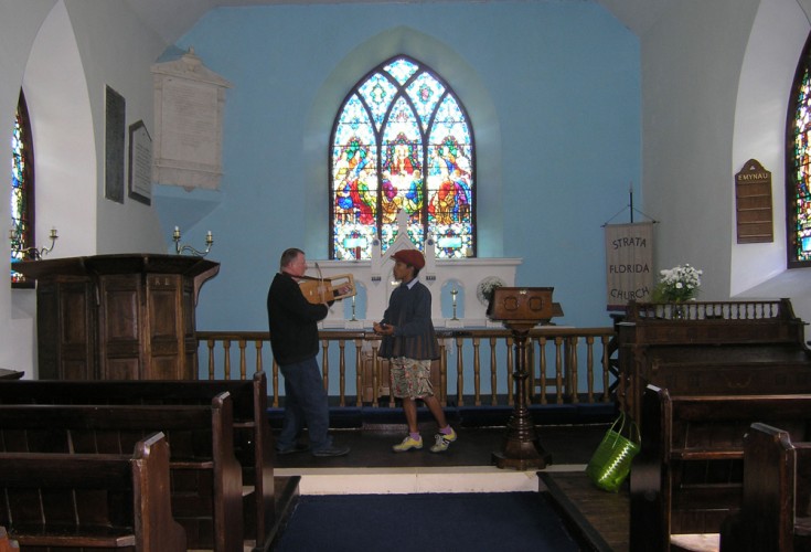 Robert Evans and Mary-Anne Roberts rehearse ‘A Gate at Ystrad Fflur’ at the Church in Strata Florida, June 2005