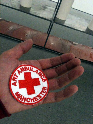 Art Ambulance Manchester in Norway, embroidered badge, 7.5cm diameter, cloth and thread