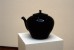 ‘Black Teapot’, 1999, clay, glaze, 18.5 x 19 x 19cm, installation at National Museum, Cardiff